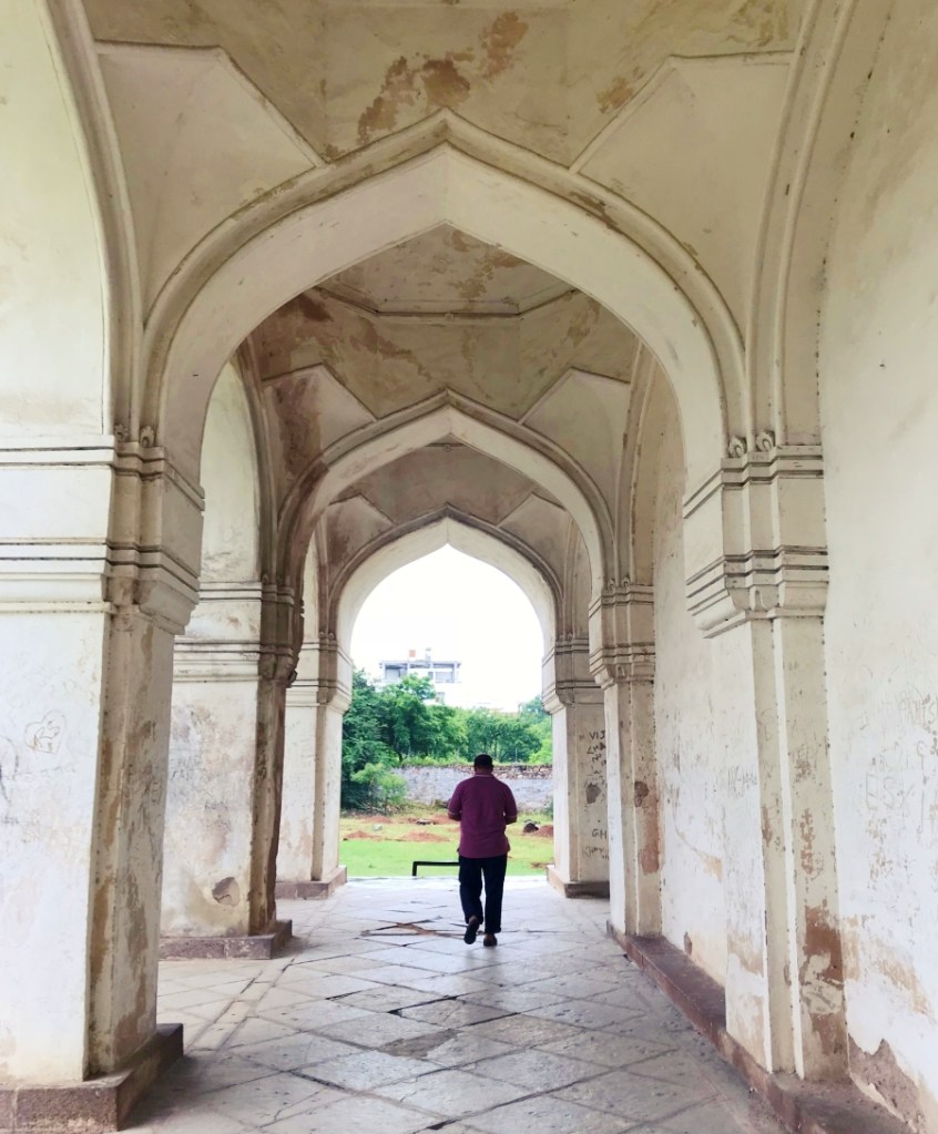 beautiful archway in white at the Qutub shahi tombs