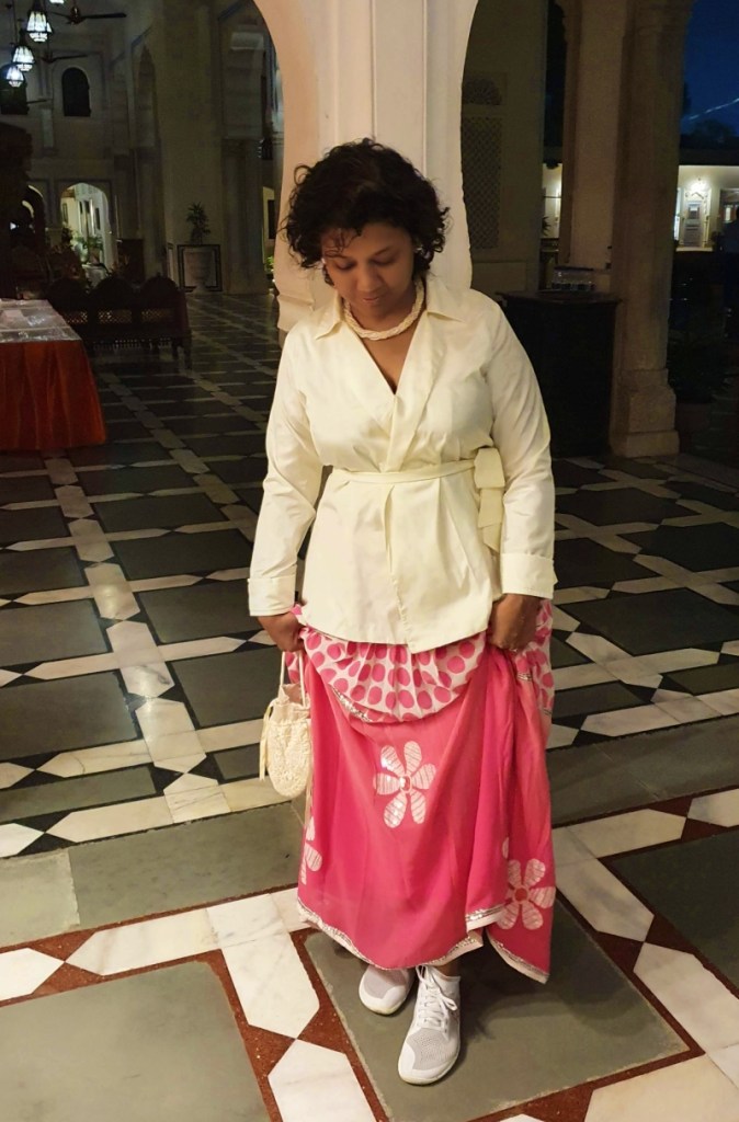 Wedding guest in lehenga with sports shoes