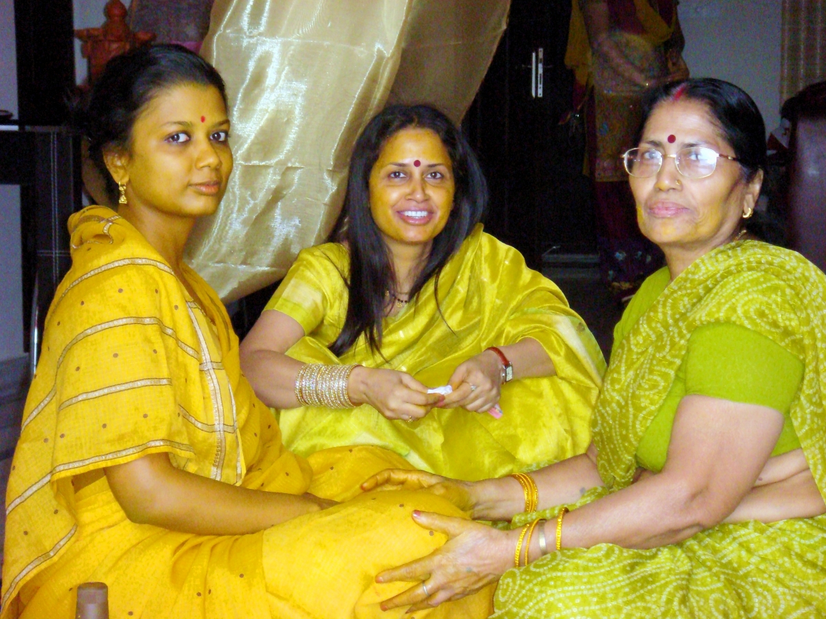 three generations of women - bride with mother and grandmother