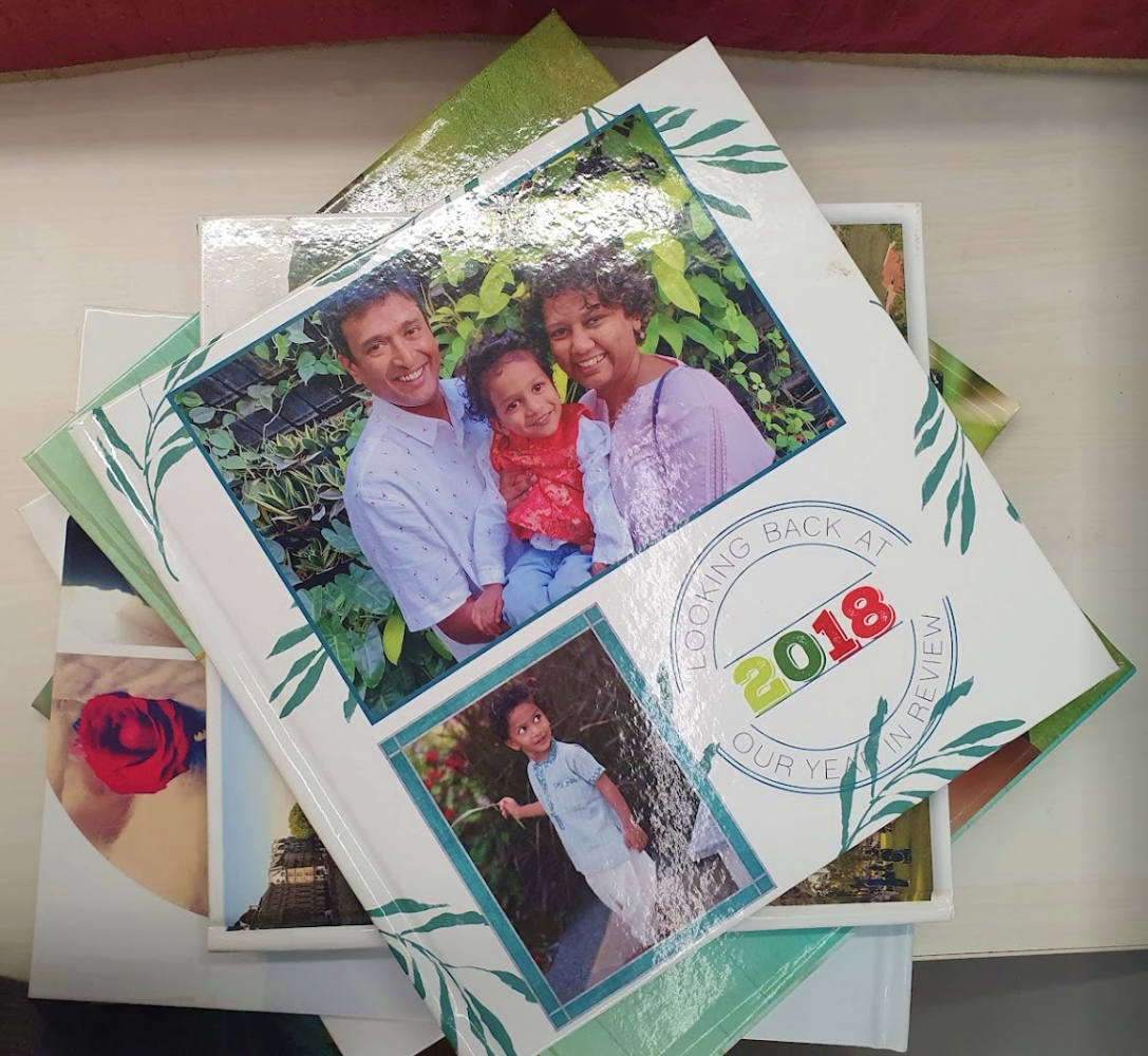 pile of printed photo books