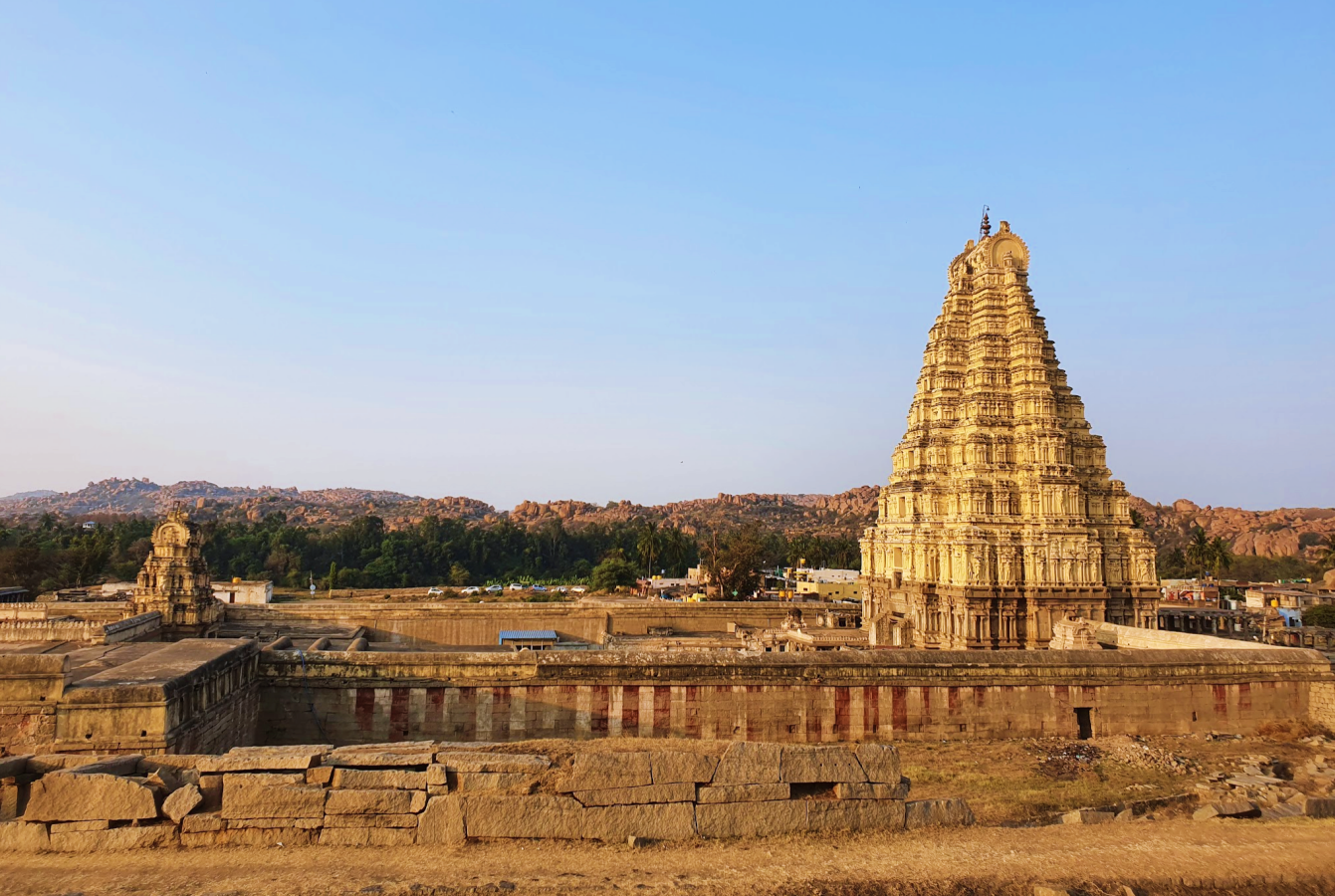 Hampi Virupaksha temple complex in the day seen from a nearby hill