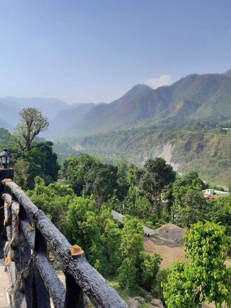 Mountain views with clear blue skies and lots of greenery all around