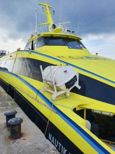 the bright yellow catamaran Nautika which ferries between port blair and havelock islands