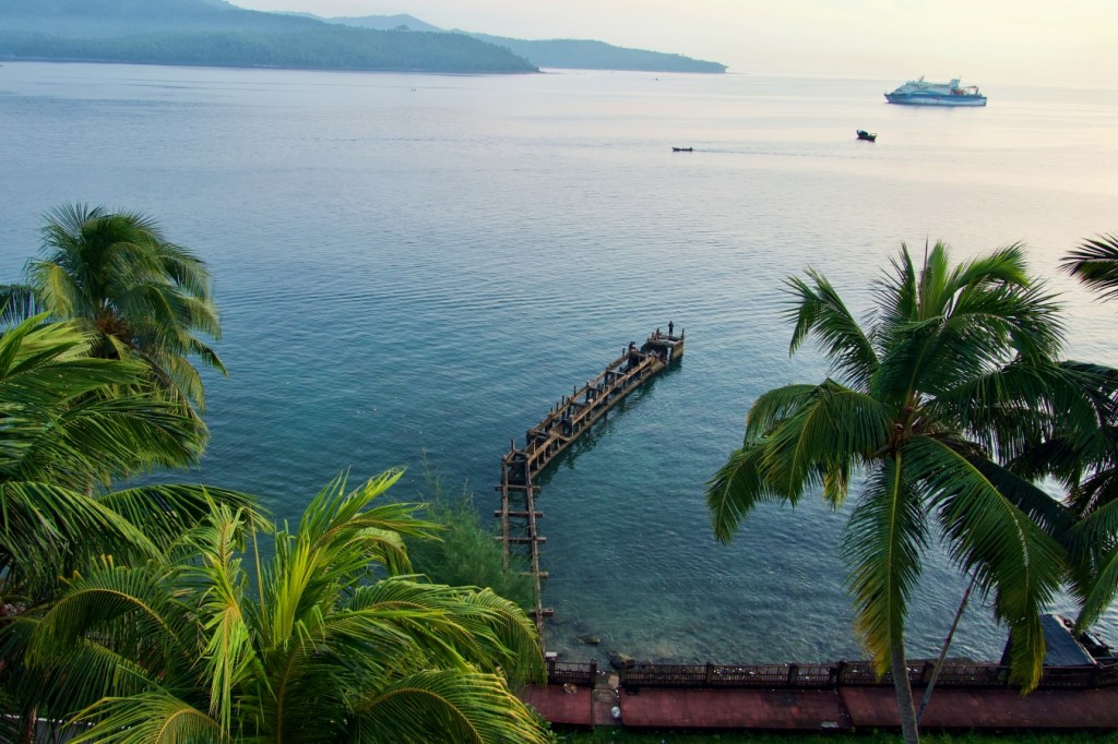 a small jetty for local fishermen and women jutting out to the sea at port blair. this was the view from the ITC welcomhotel at port blair with the smaller islands visible in the distance