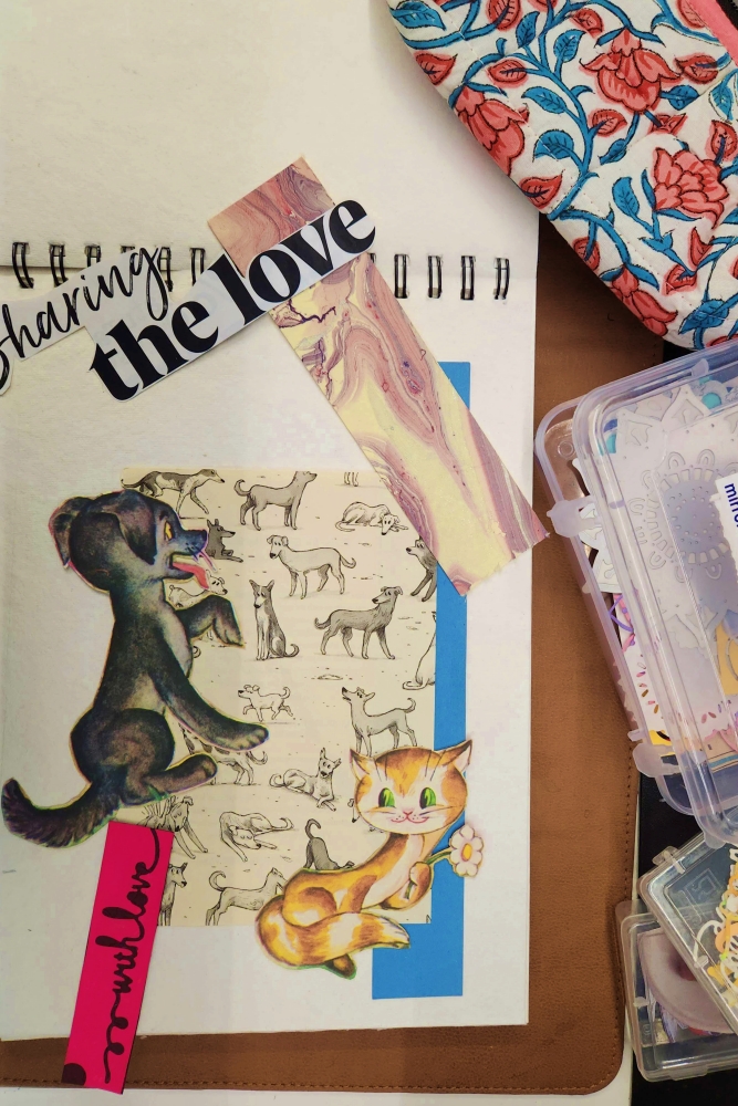 various elements of a collage is spread out on a sheet of paper with boxes and pouches around