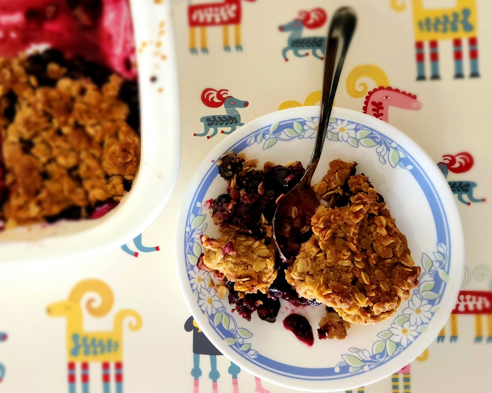 Mixed berry crumble served in a bowl