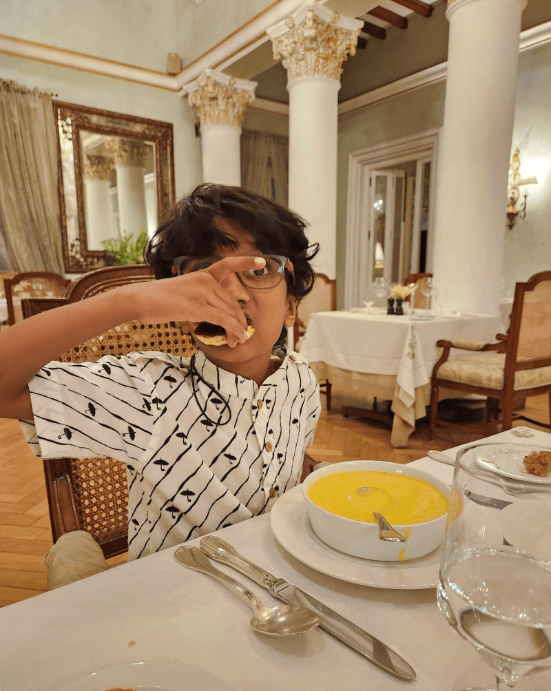 child enjoying dinner