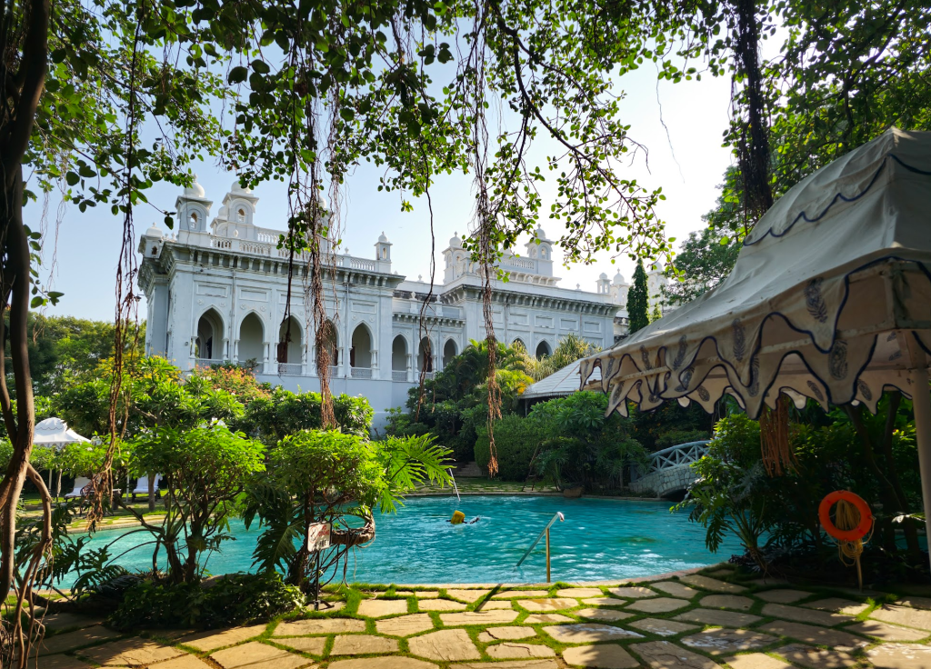 swimming pool with the palace at the back
