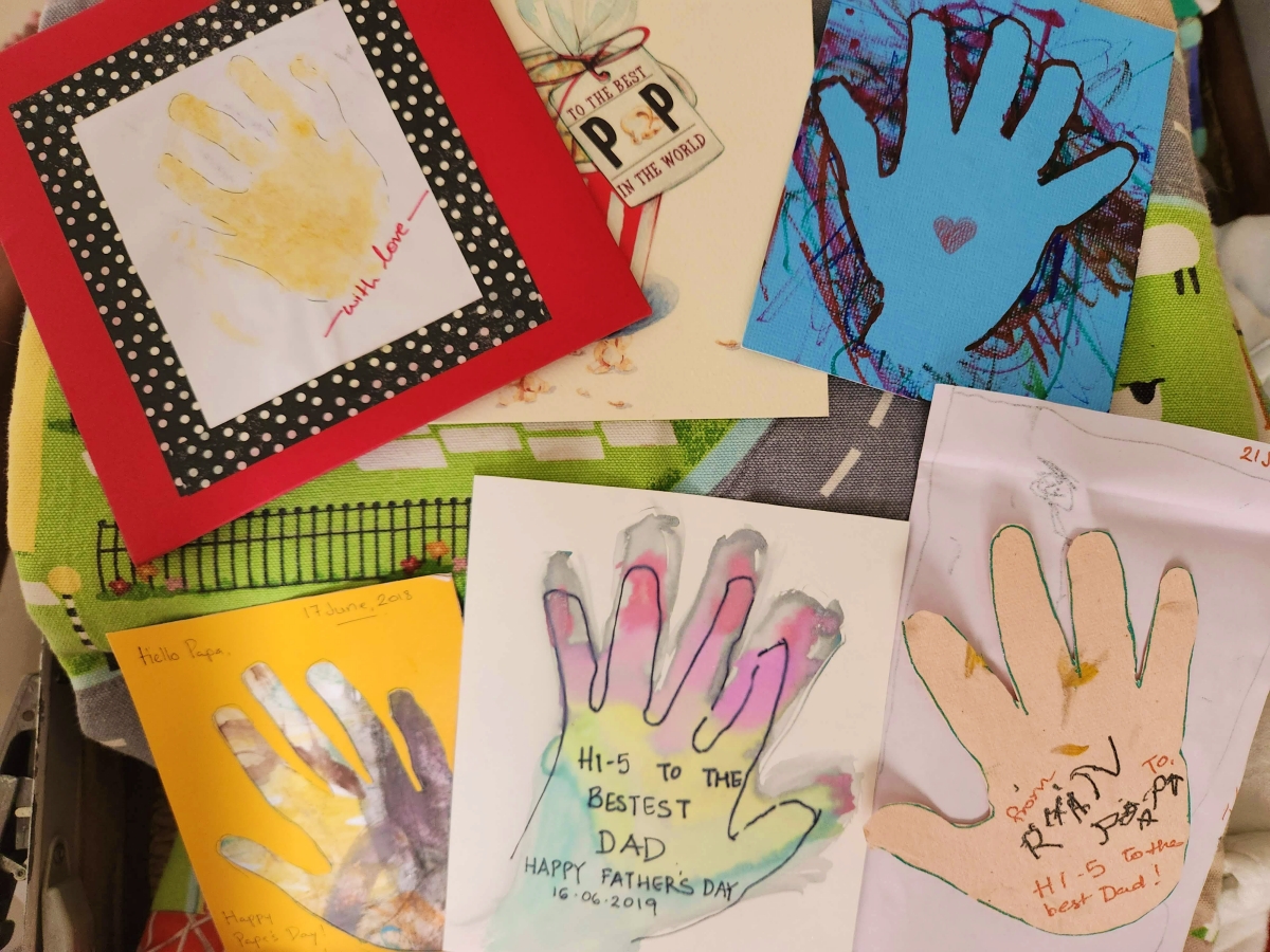father's day cards over the years with hand prints of the child