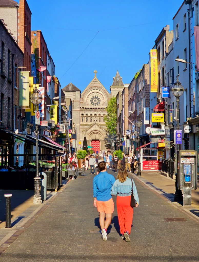 Couple walking along Grafton Street in Dublin, Ireland