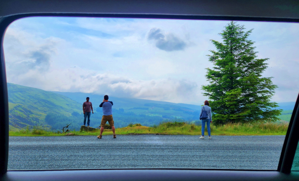 taking pictures at a scenic spot at wicklow gap in ireland