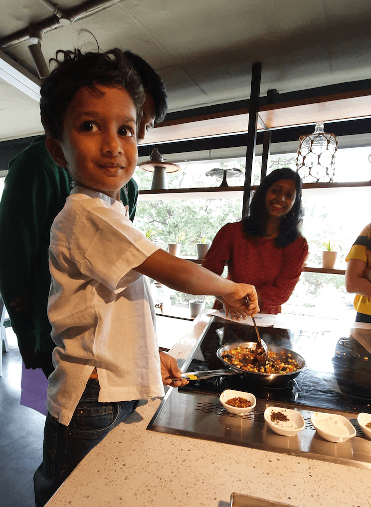 Child in a cooking class