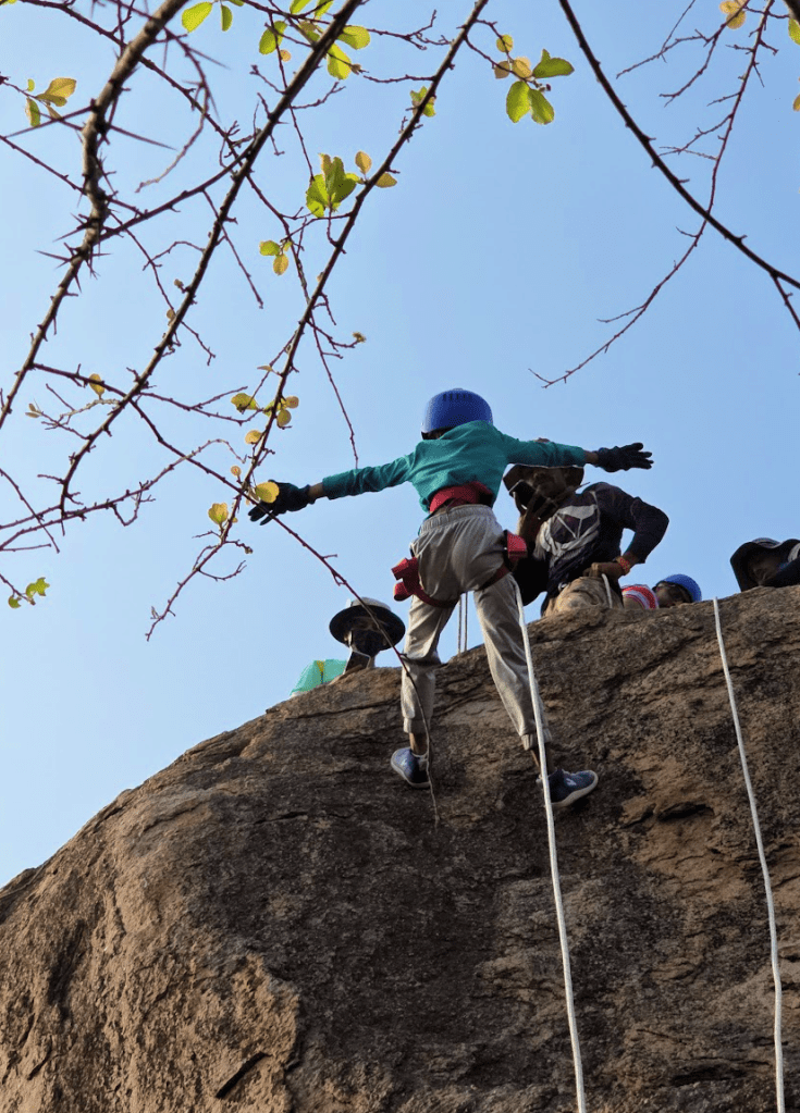 child learning rappelling in hyderabad