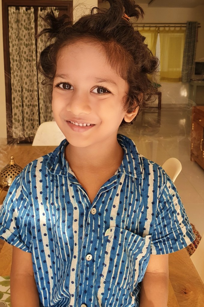 boy with piggy tails